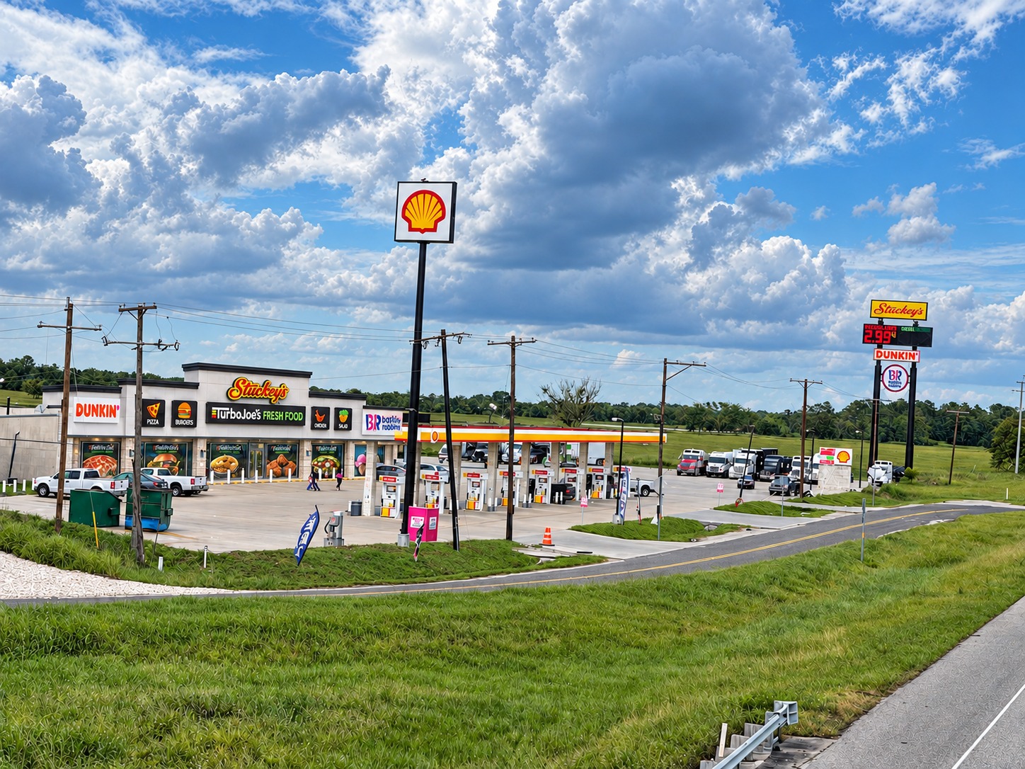 Roadside view of Stuckey’s and Shell with Turbo Joe’s storefront signage